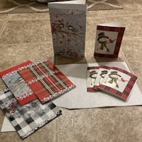 a set of christmas cards on the floor