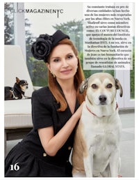 a woman is posing with her dog in a magazine