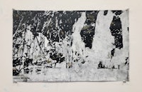 a black and white painting hanging on a wall