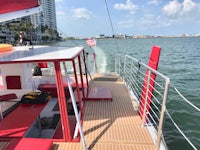 the deck of a boat with a red and white deck