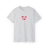 a grey t - shirt with a red heart on it