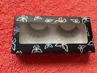 a pair of false eyelashes in a box
