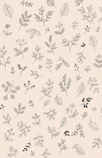 a black and white pattern of leaves on a beige background
