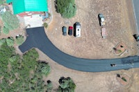 an aerial view of a paved road