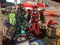 a christmas tree and a robot on a table