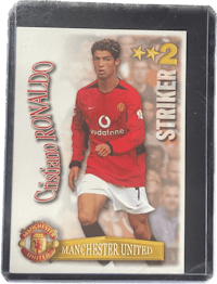 a manchester united soccer card with ronald ronaldo on it