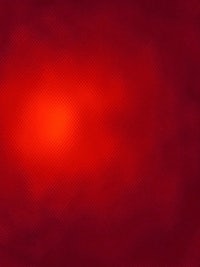 a red background with a bright light in the middle