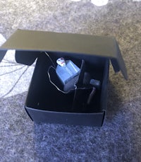 a black box with a small electronic device inside