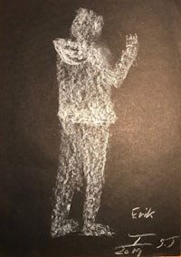 a drawing of a person standing on a blackboard
