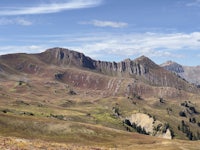 a mountain range with a blue sky