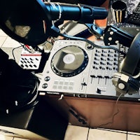 a dj set up with headphones and a microphone