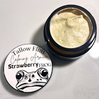 a jar of strawberry frog face cream