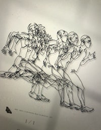 a wire drawing of a group of people running