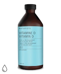 a bottle of vitamin - d serum on a white background