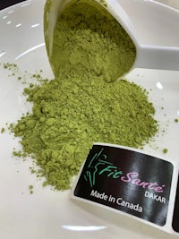 matcha powder in a white bowl with a label on it