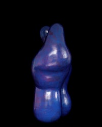 a blue sculpture on a black background