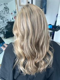 the back of a woman's hair in a salon