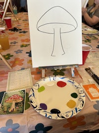 a white board with a drawing of a mushroom on it