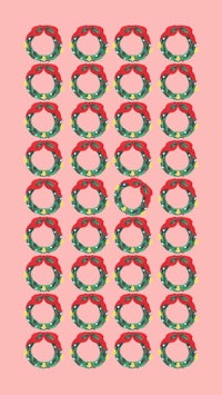 christmas wreaths on a pink background
