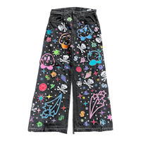 a pair of denim pants with colorful designs on them
