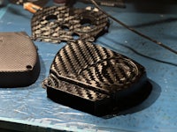 carbon fiber parts on a workbench