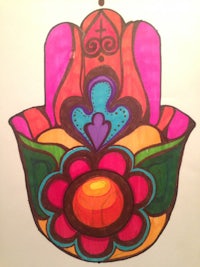 a colorful drawing of a hamsa