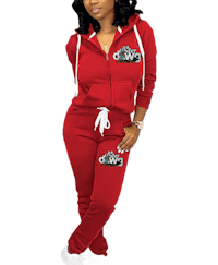 a woman wearing a red hoodie and jogging pants