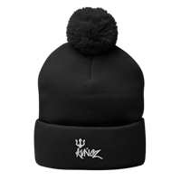 a black beanie with the word kingz on it