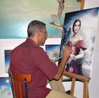 a man painting a portrait