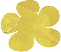 a yellow flower cut out of a piece of paper