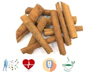 a pile of cinnamon sticks on a white background