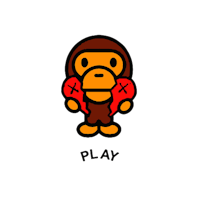 a monkey holding a red boxing glove with the word play on it
