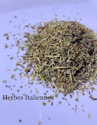 herbs italianes on a white plate