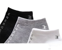 three pairs of socks with the word energize on them