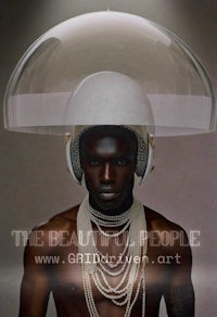 a man wearing a helmet with pearls on his head