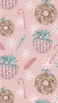 christmas wreaths and candy canes on a pink background