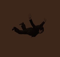 a man in a suit is falling in the air