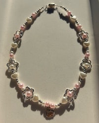 hello kitty necklace with pearls and charms