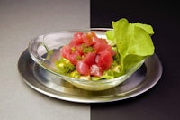 a bowl of tuna salad on a plate