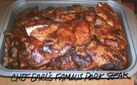 bbq ribs in a pan with the words chef elk's famous ribs