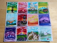 tarot cards with a variety of landscapes on them