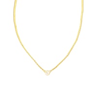 a gold necklace with a small diamond on it
