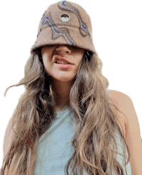 a woman wearing a brown bucket hat