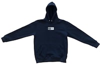 a navy hoodie with a white logo on it