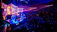 esports tournament in a stadium with a large crowd