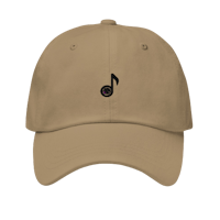a tan hat with a music note on it