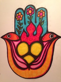 a colorful drawing of a hamsa with birds and flowers