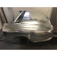 an image of a silver car in a garage