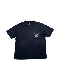 a blue t - shirt with an image of an eagle on it