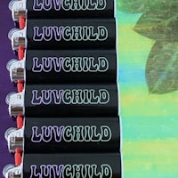 a group of lighters with the word luvchild on them